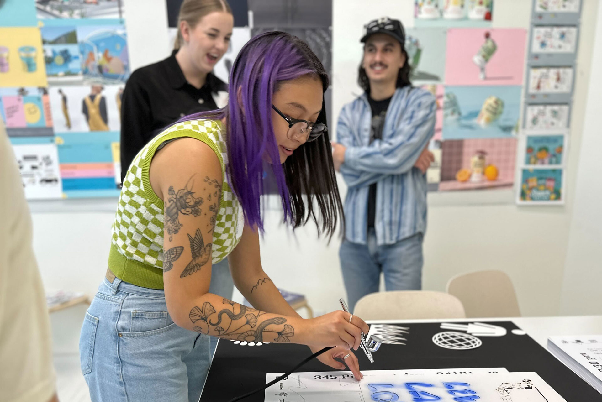 Enlisted team member at an AIGA Design Week event hosted at the SLC studio